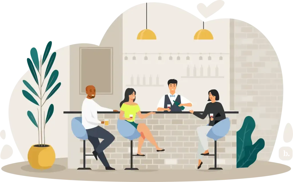 A group of people are sitting at a bar in a restaurant.