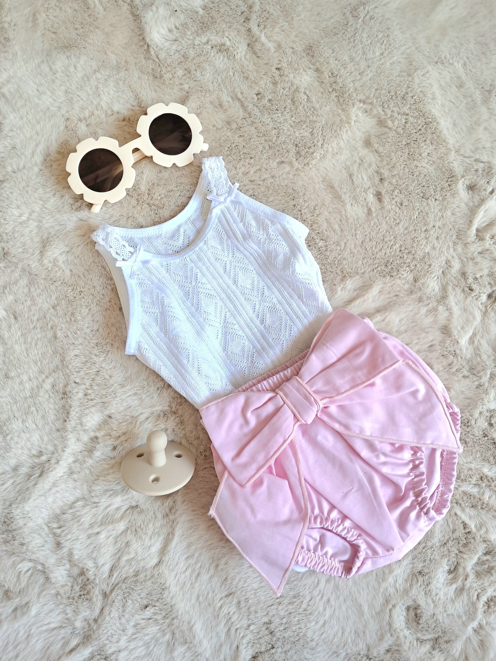 Roze baby broekje met grote strik