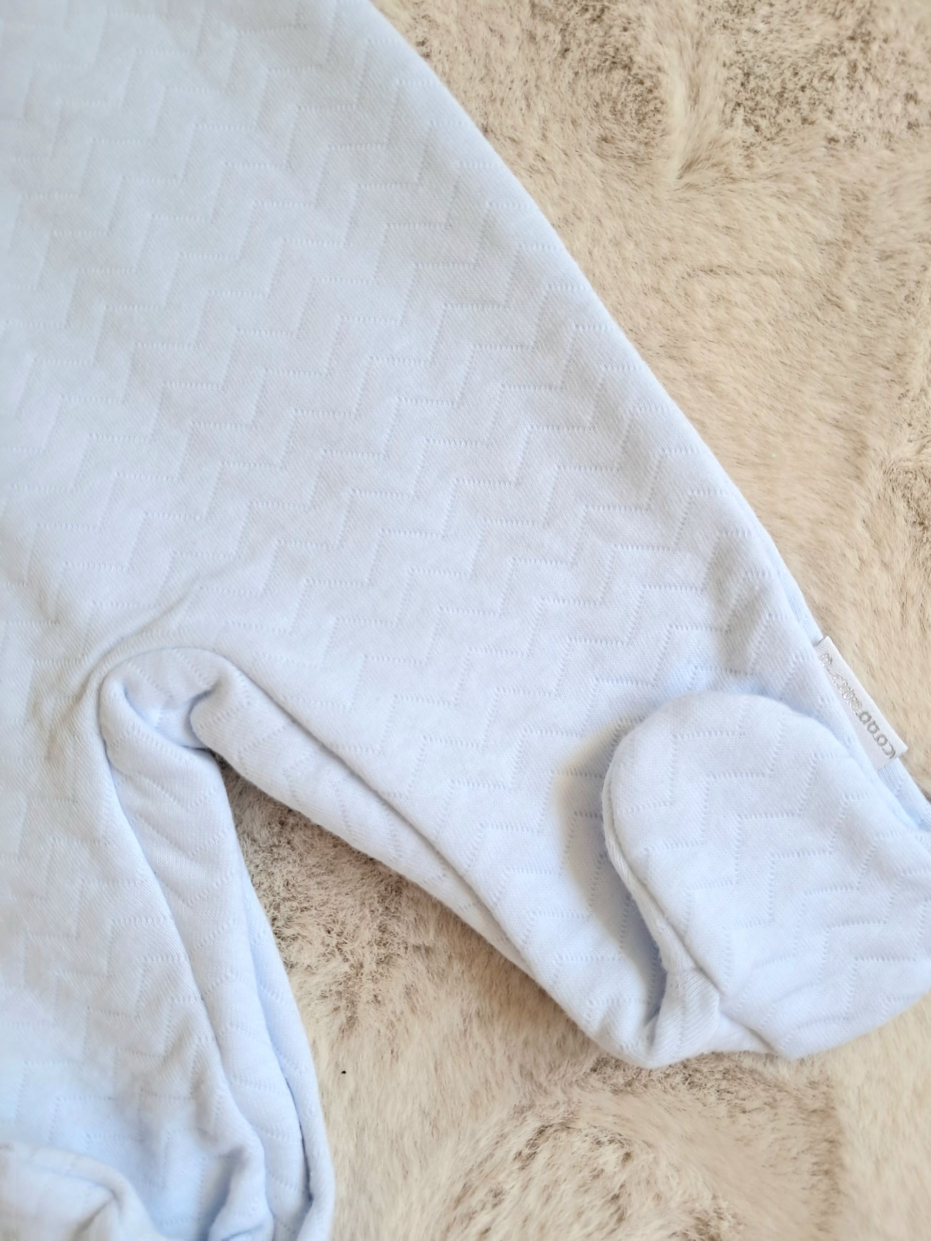 Blauwe baby pakje met kraagje