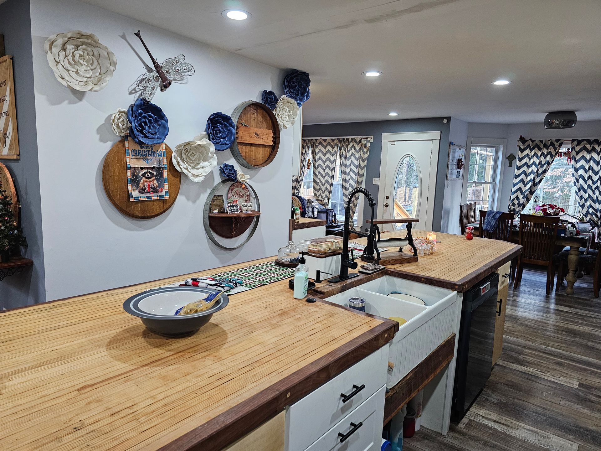 A kitchen with a sink and a bowl on the counter.