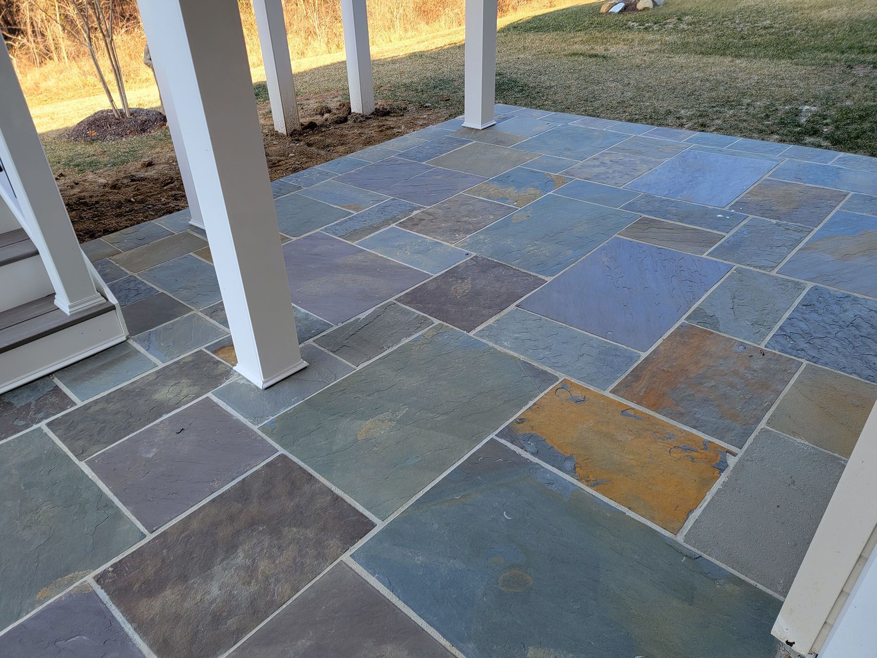 A patio with a lot of tiles on it