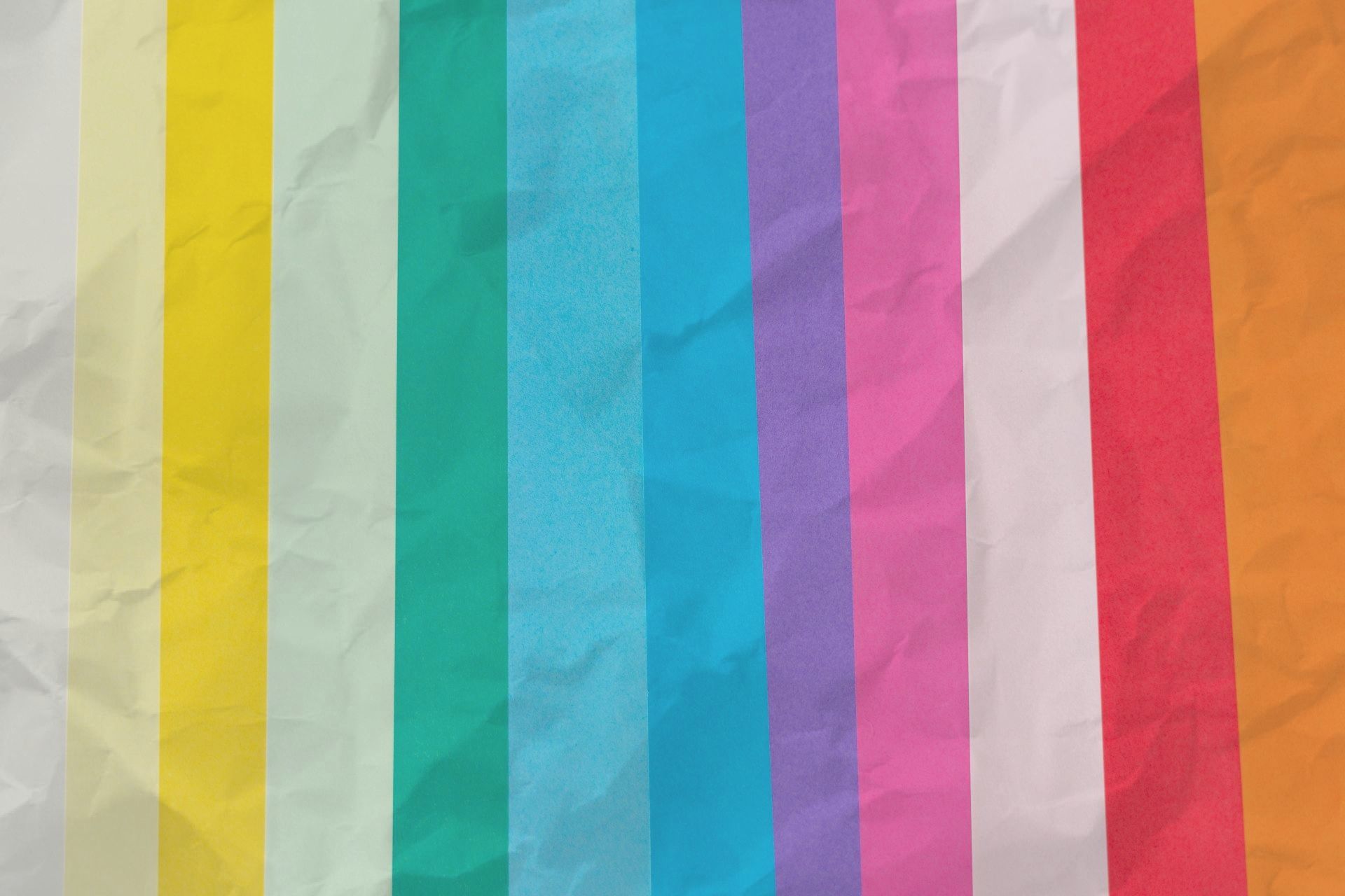 A close up of a colorful striped fabric.