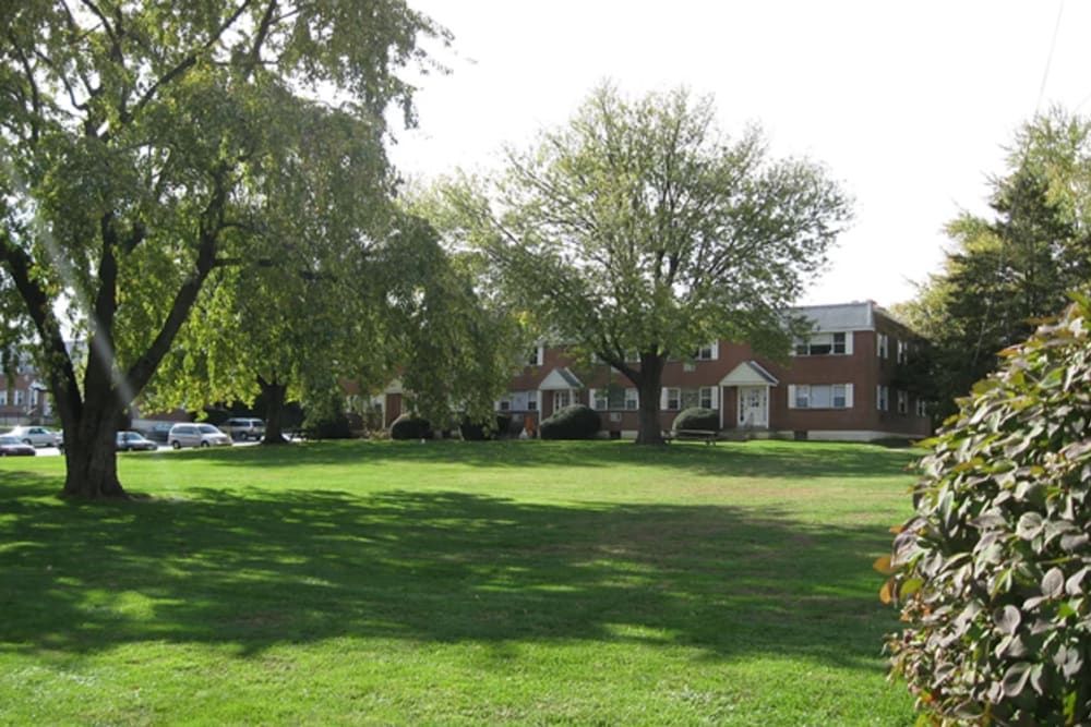 View of landscaped green space around apartment buildings