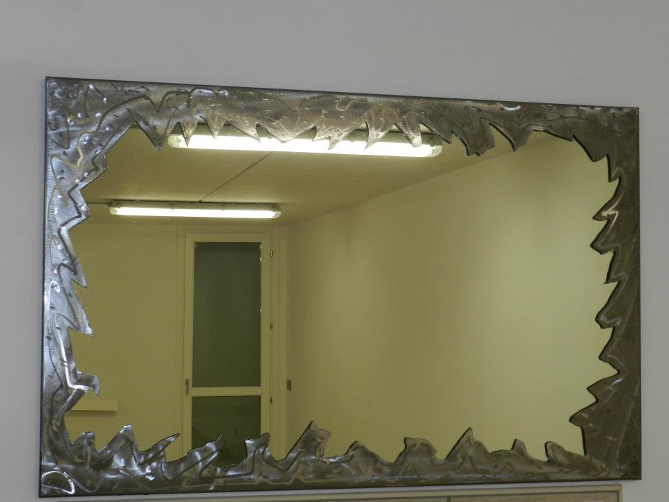 vasi, specchi e complementi in acciaio