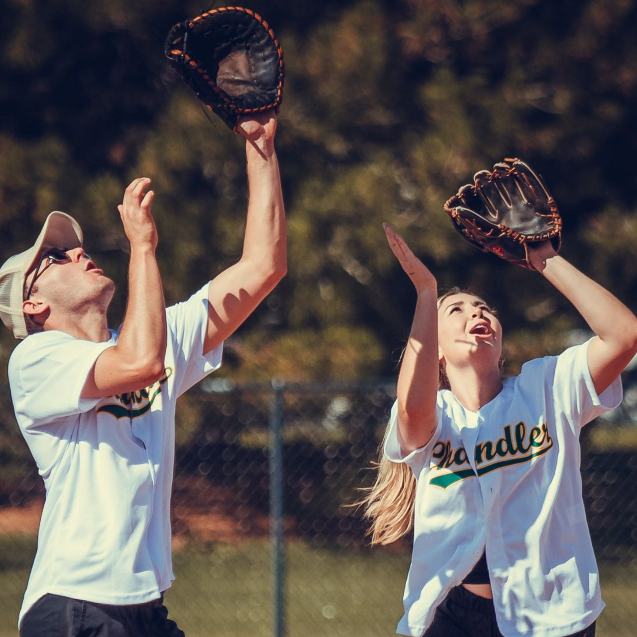 Co-Ed softball players attempting to catch a pop-fly.