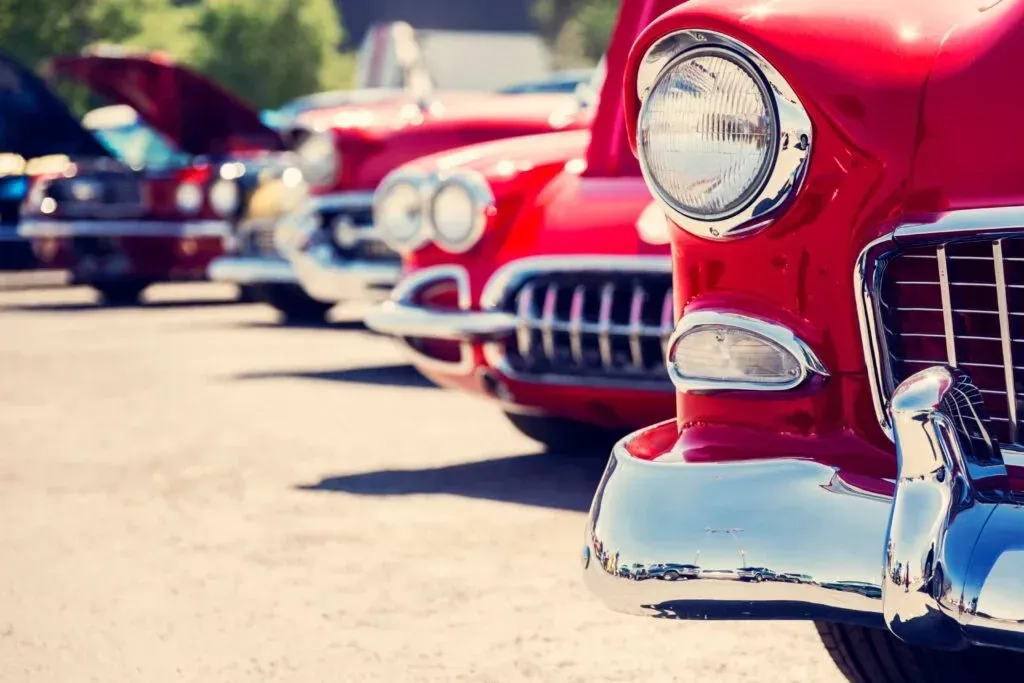 classic car next to vintage car