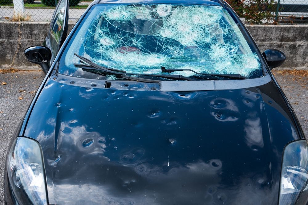 A car with bad hail damage.