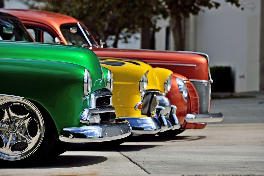 A row of classic cars that are worth the investment.