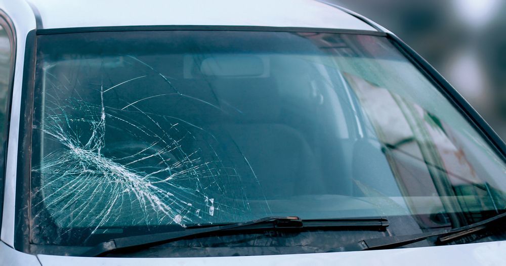 cracked car windshield after a car accident 