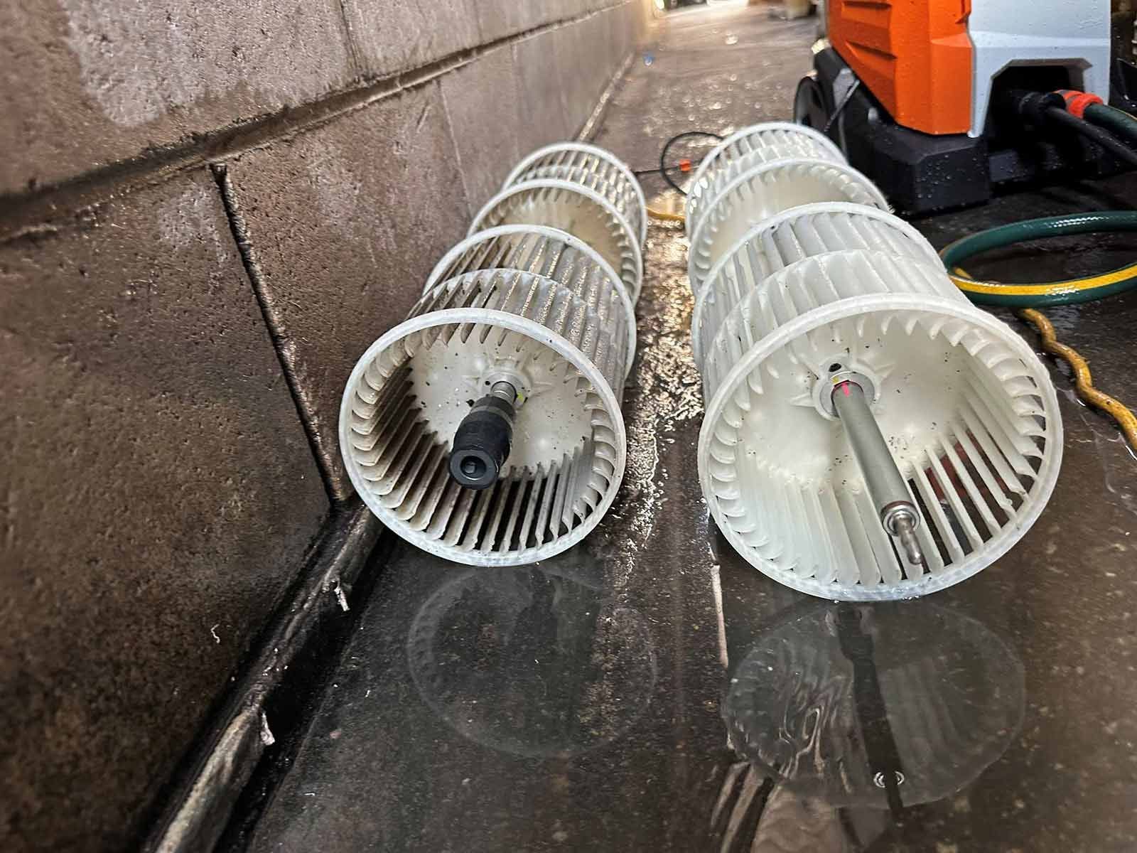 Two Dirty Blower Filters Are Sitting On The Ground Next To A Hose — COOLIT NT In Katherine, NT