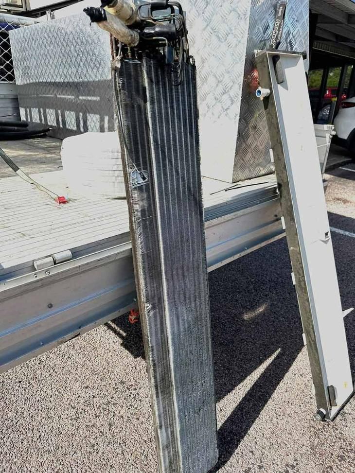 A Piece Of Metal Is Sitting On The Ground Next To A Ladder — COOLIT NT In Palmerston, NT