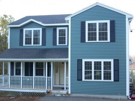 Blue Siding House - Customized Decks in Leominster, MA