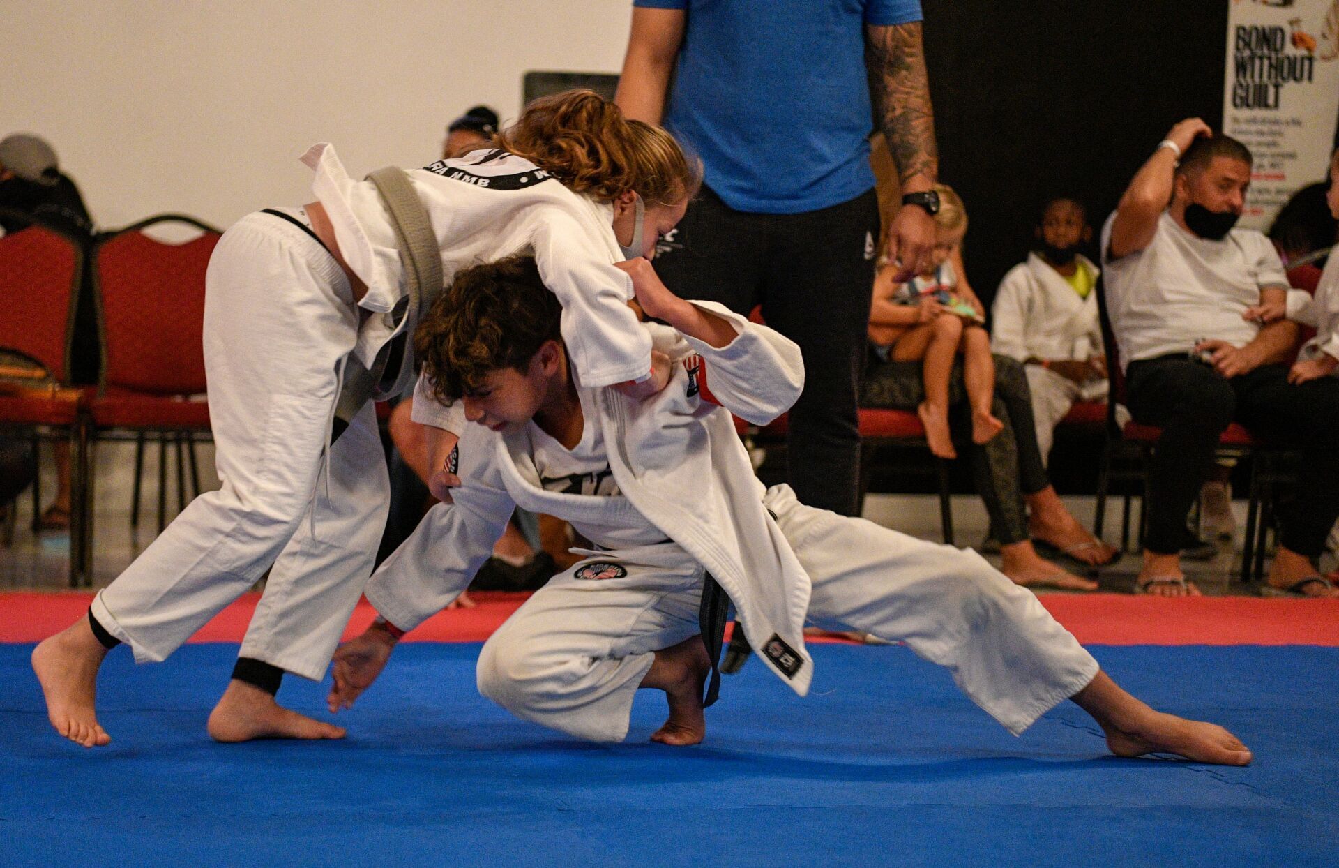 kid going for a takedown at American Top Team Aventura/NMB