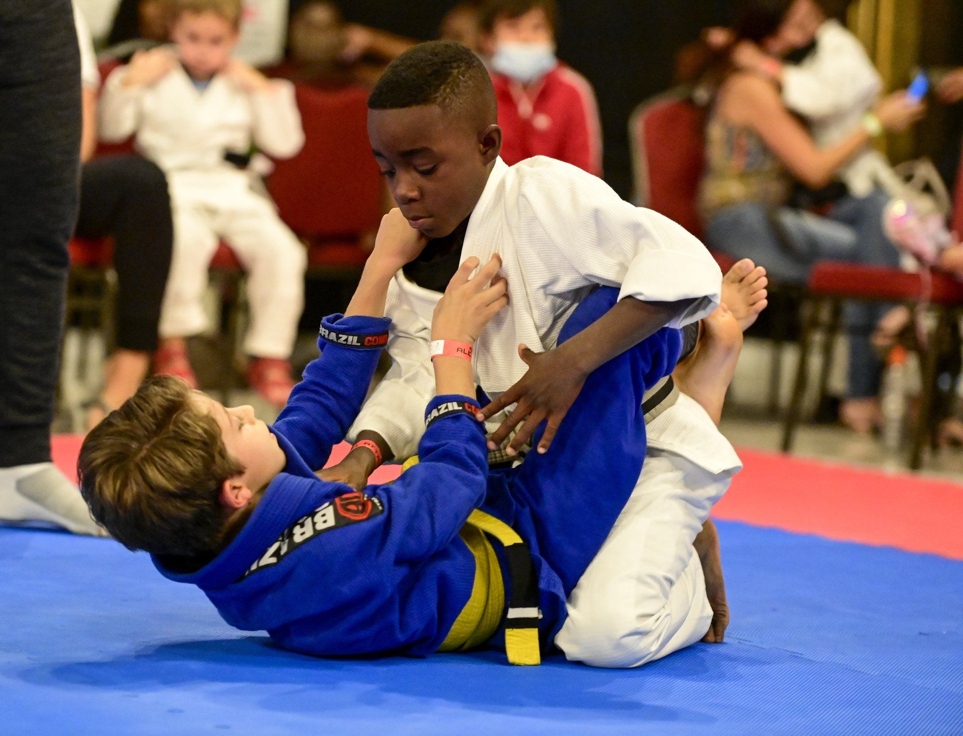 two kids doing Brazilian Jiu-Jitsu at ATT NMB Aventura