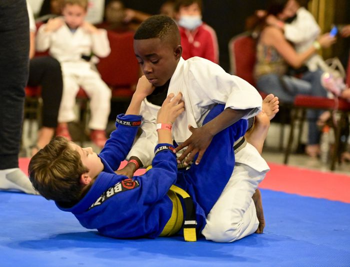 two kids doing Brazilian Jiu-Jitsu at American Top Team Aventura/NMB