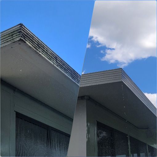 Before and after comparison of a building's roof cleaning; the left side is dirty, the right side is clean.