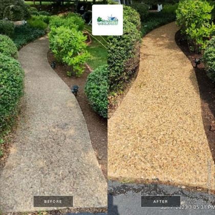 Before and after: Power washed concrete walkway. Dark, dirty path transforms into light, clean concrete.