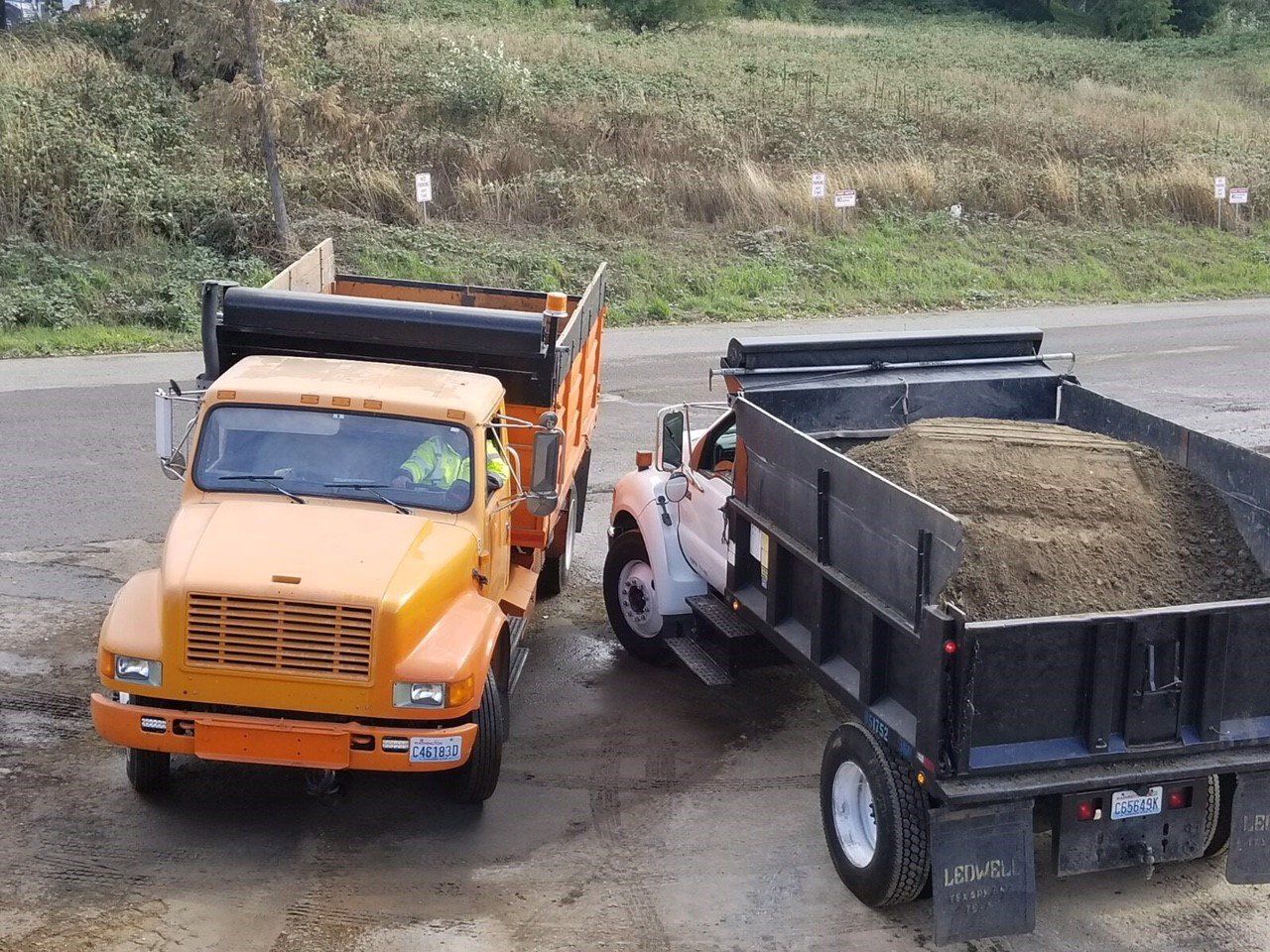 Trucks — Sunrise Landscape Trucks At Work In Everett, WA