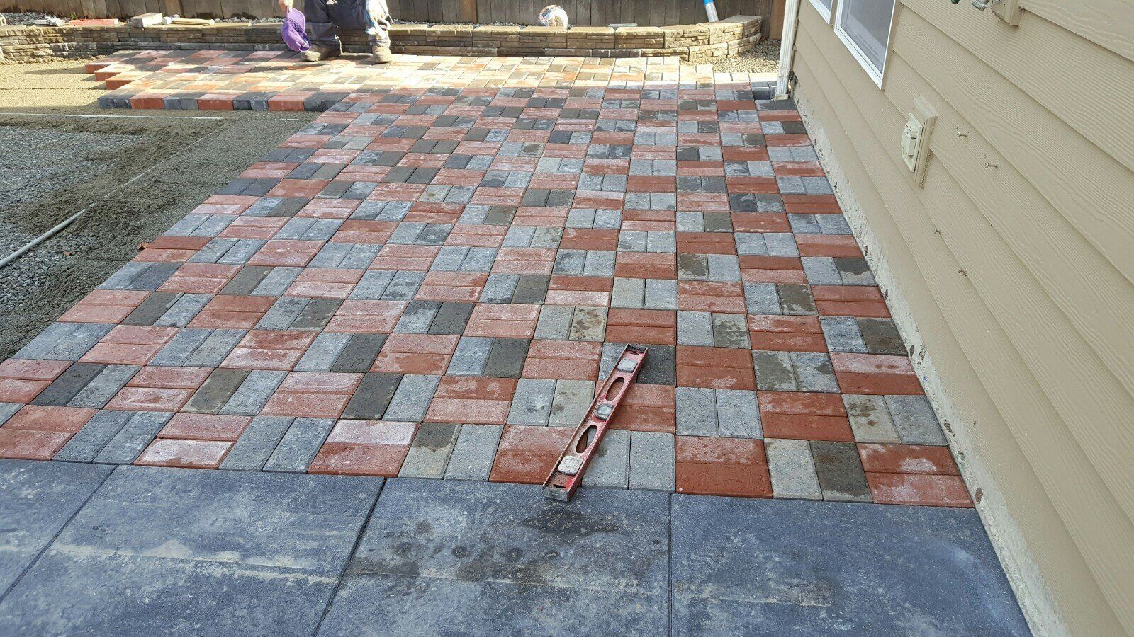 New Brick Flooring — Brick Backyard Flooring Laying Down Bricks In Everett, WA