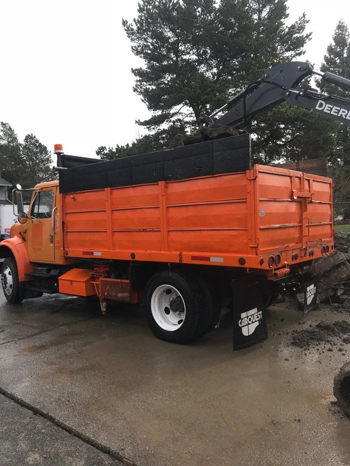 Debris — Debris Being Loaded Into Dumptruck In Everett, WA
