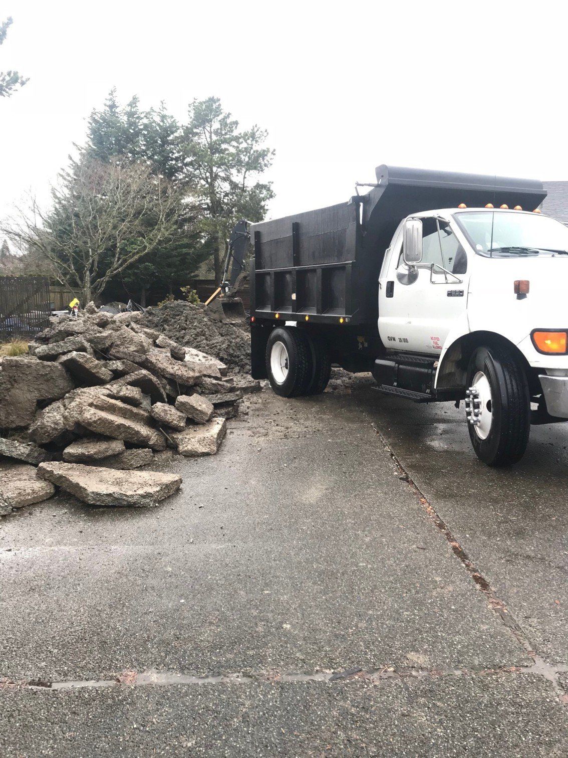 Demolition — Dumptruck Getting Ready To Load Demolition Debris In Everett, WA