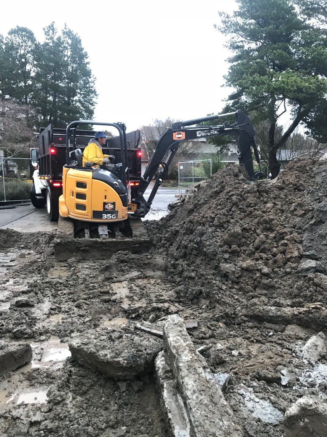 Removing — Excavator Removing Debris In Everett, WA