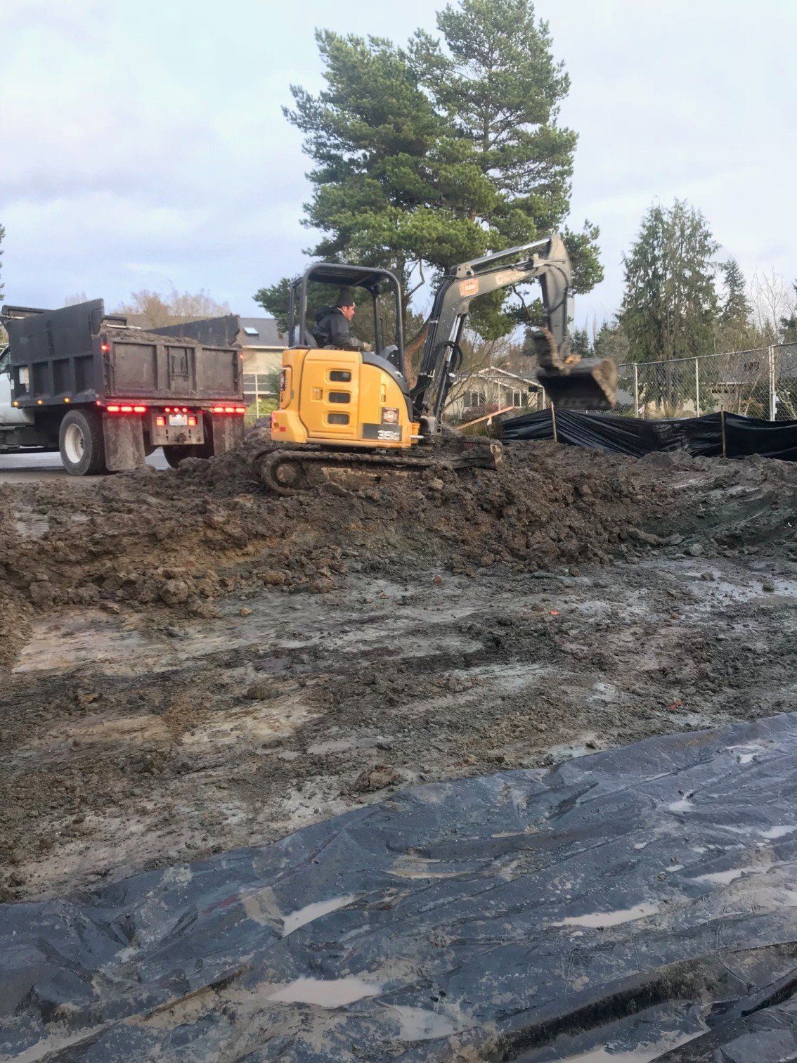Work — Excavator Removing Demolition Debris In Everett, WA