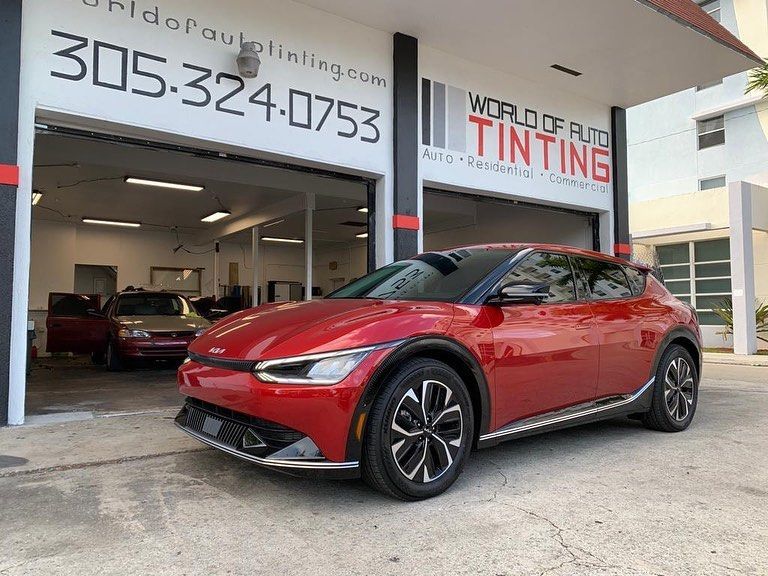 Red Kia EV6 parked outside a