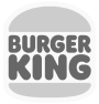 The burger king logo is black and white and looks like a hamburger.