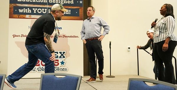 CAMEX25 speaker Joel Zeff with volunteers from the audience.