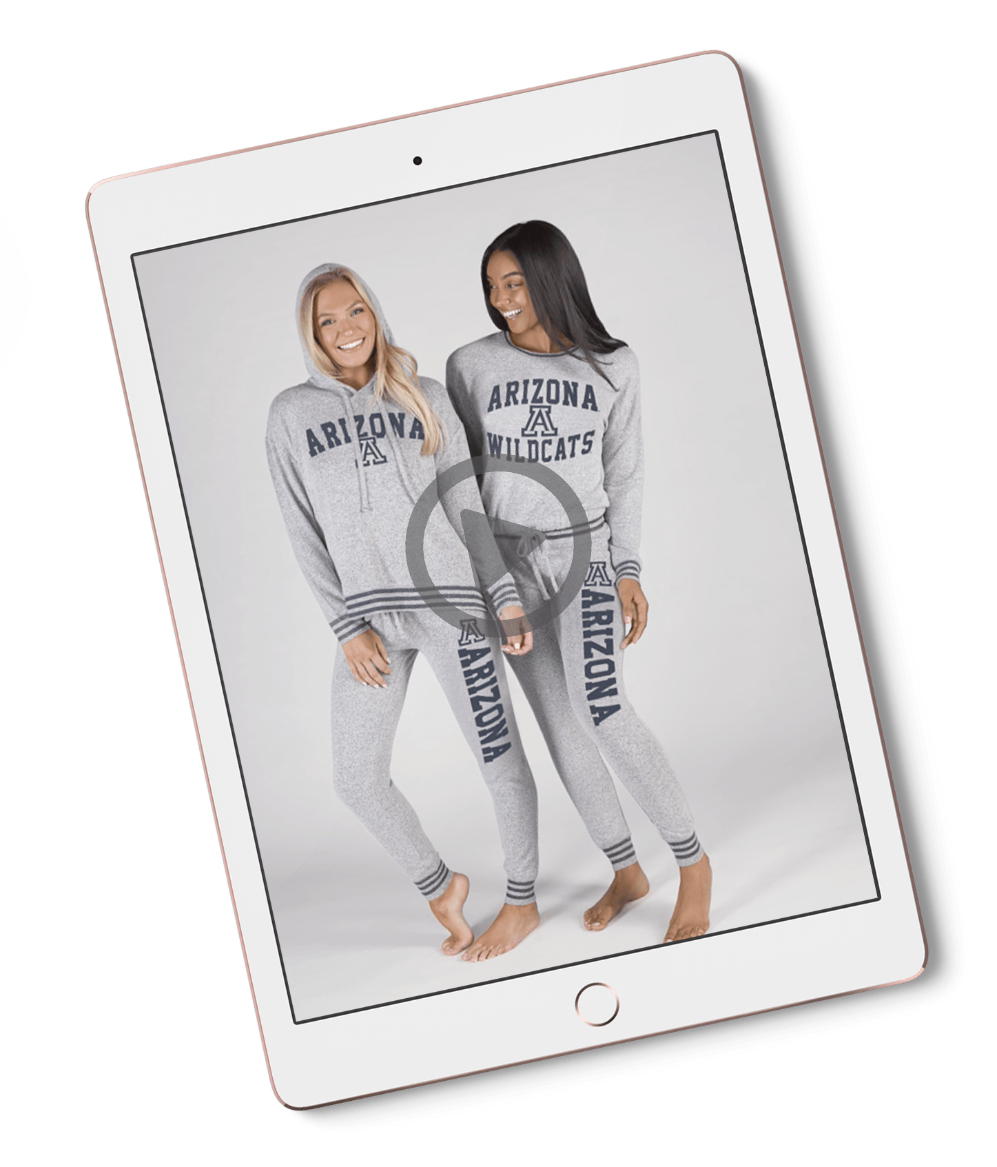 Two women wearing arizona pajamas are standing next to each other on a tablet.