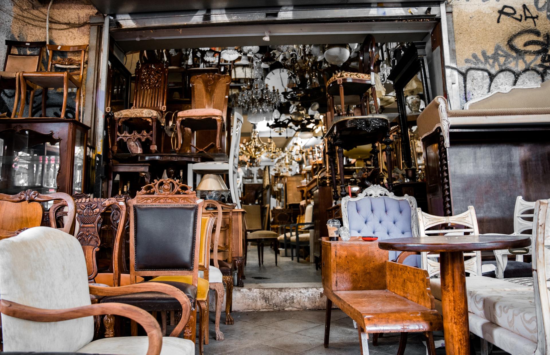 A store filled with lots of chairs and tables.
