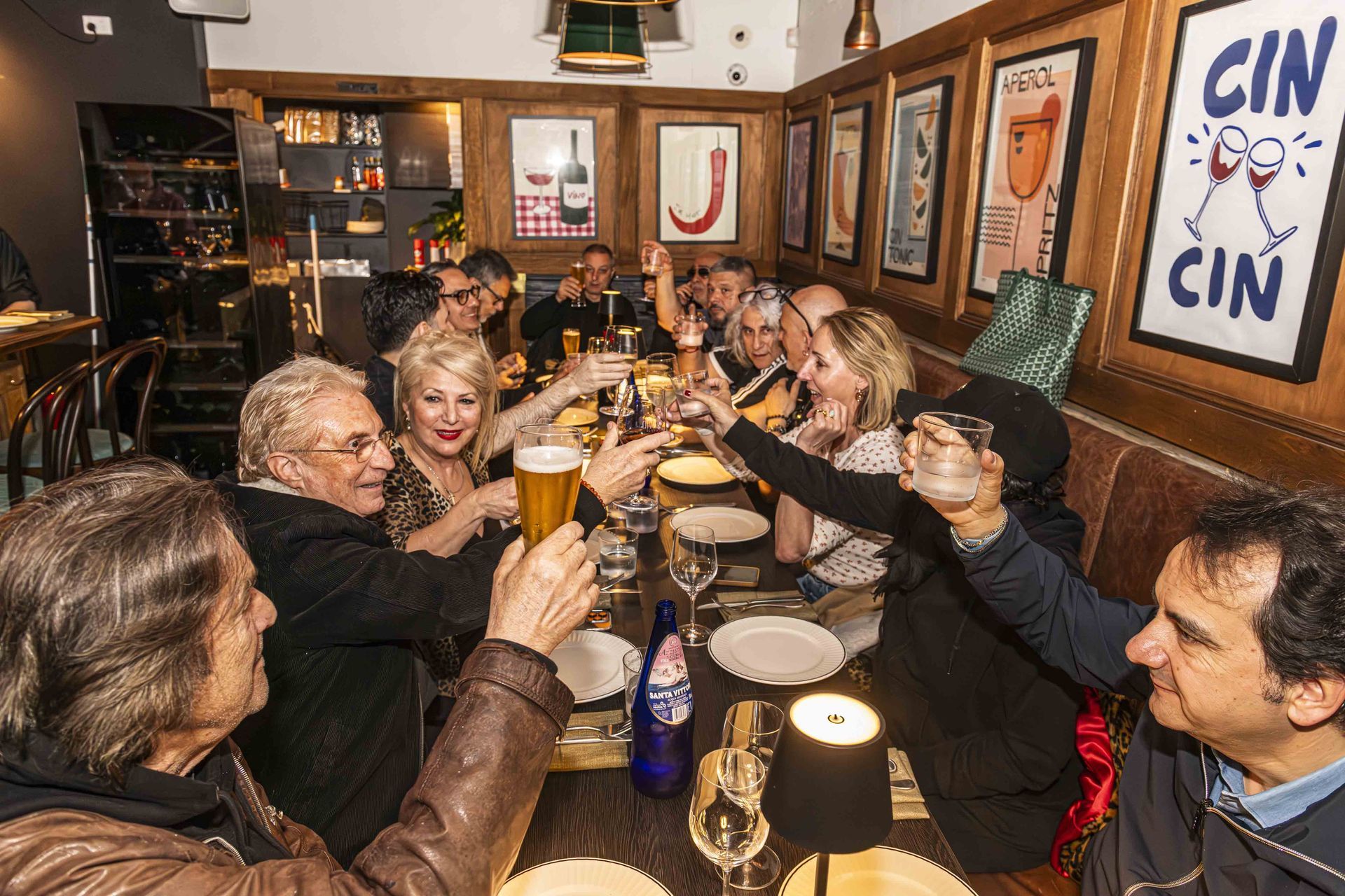A group event where everyone is making a salute