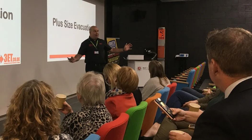 Man giving a presentation titled 