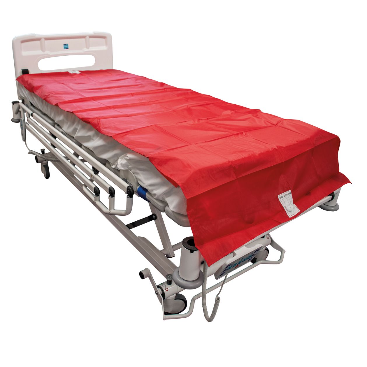 Red disposable sheet on a hospital bed.