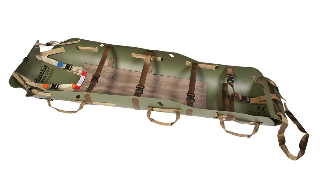 Green and tan military-style rescue stretcher with straps and handles.