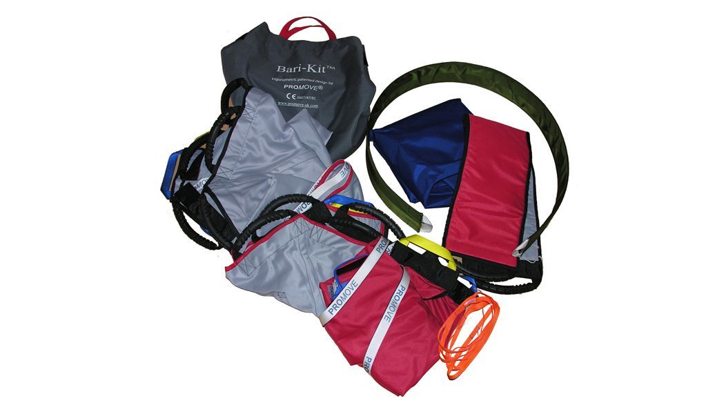 Various bags and straps, including gray, red, and blue fabrics, and an orange rope, likely related to luggage or travel.