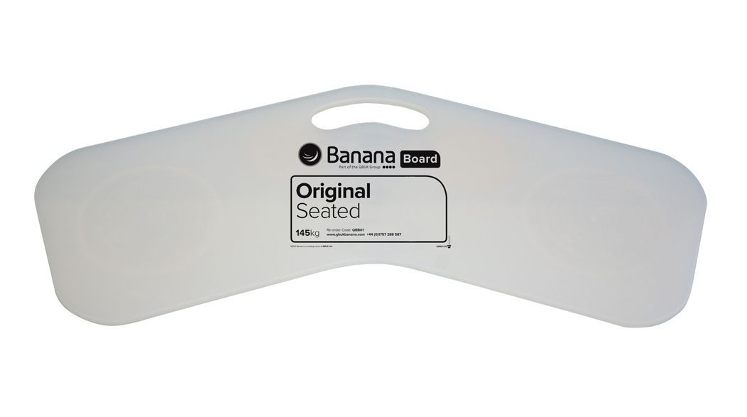 White, boomerang-shaped transfer board with a handle and black text that reads 