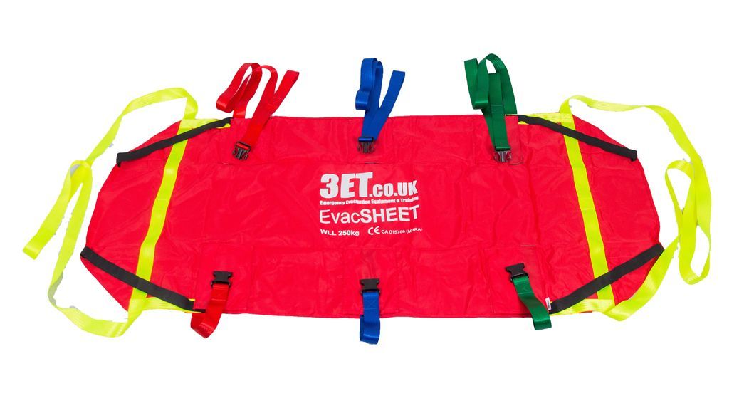 Red patient transport sheet with coloured straps.