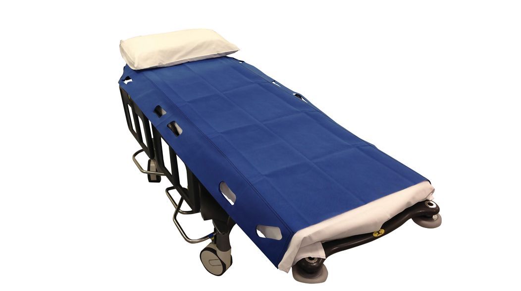Blue and white medical stretcher with pillow, on wheels, angled upward at the head.