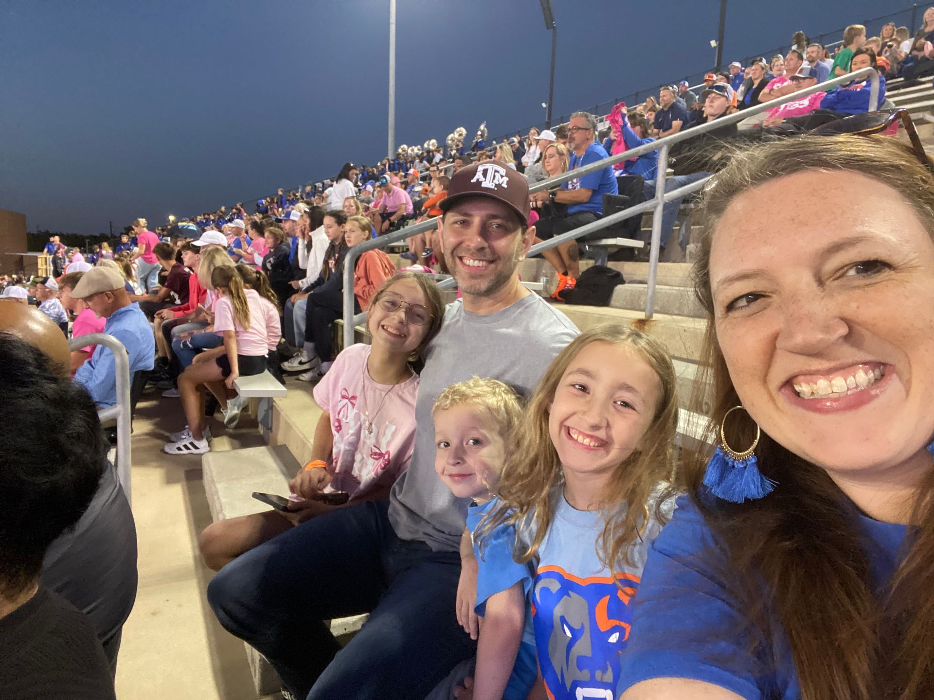 The Tsamouris family at a CISD football game