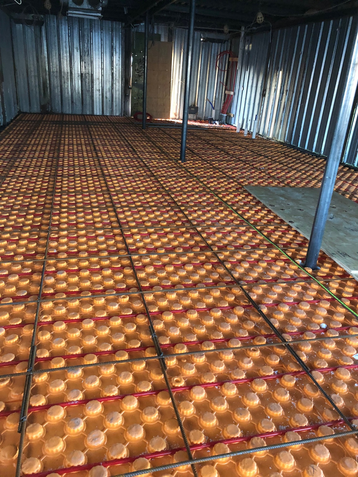 A room with a lot of eggs on the floor.