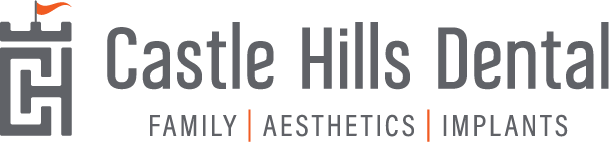 the logo for castle hills dental family aesthetics and implants