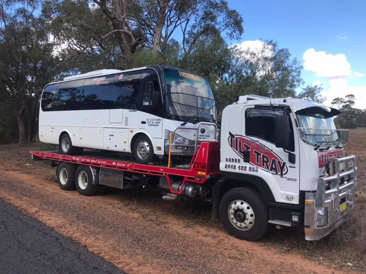 Truck Towing red car — Towing in Dubbo, NSW