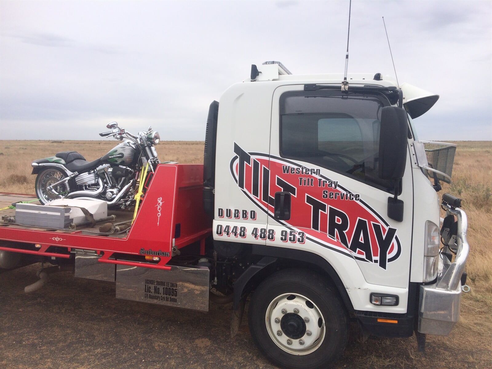 Truck Towing motorbike — Accident Towing in Dubbo, NSW