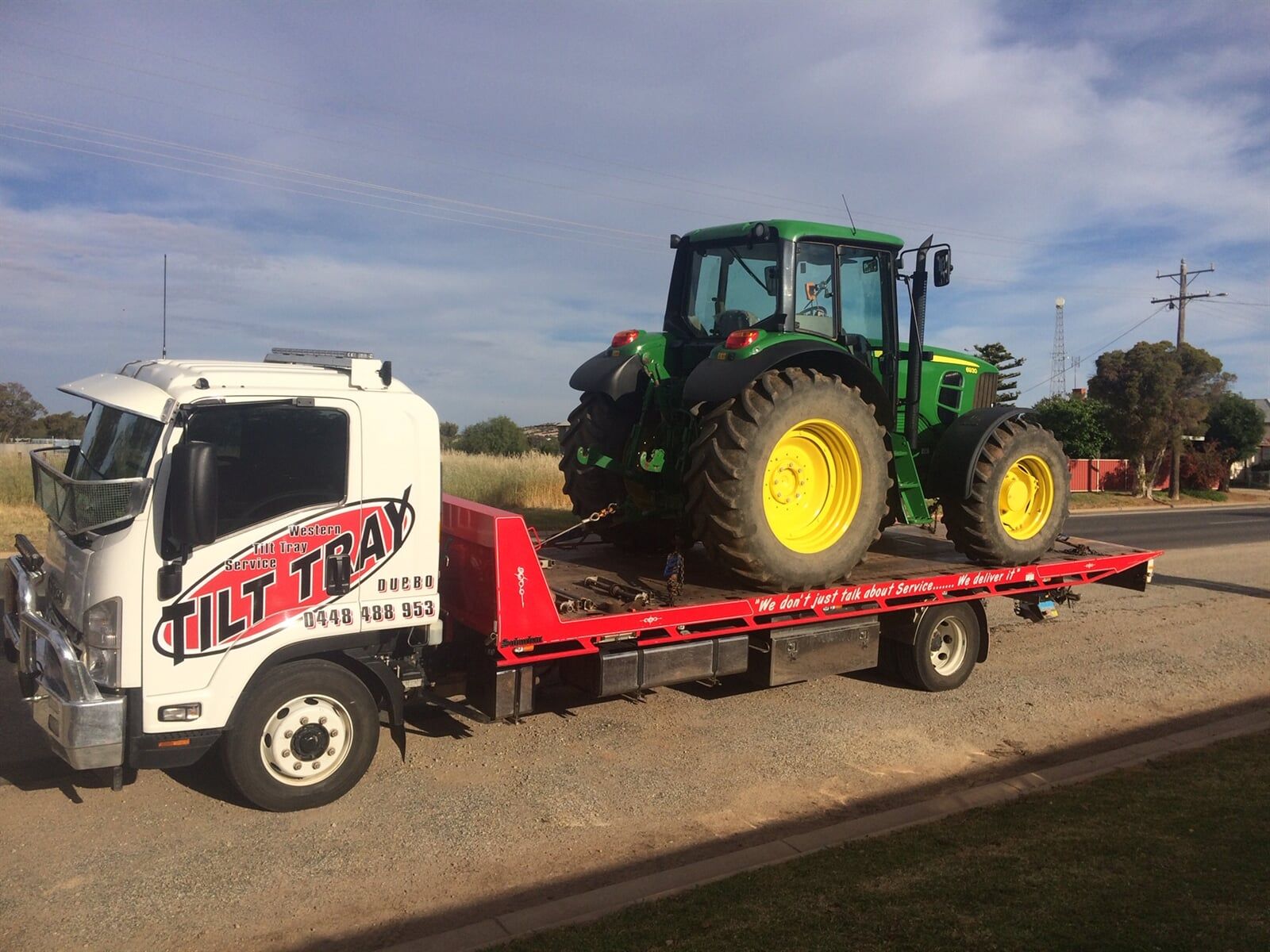 Truck towing tractor — Towing in Bourke in Dubbo, NSW