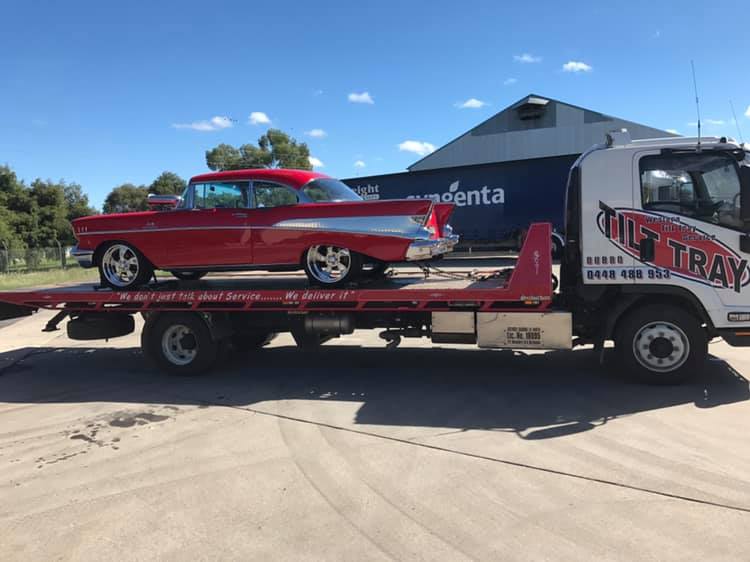 Truck Towing a red Car — Towing in Cobar, NSW