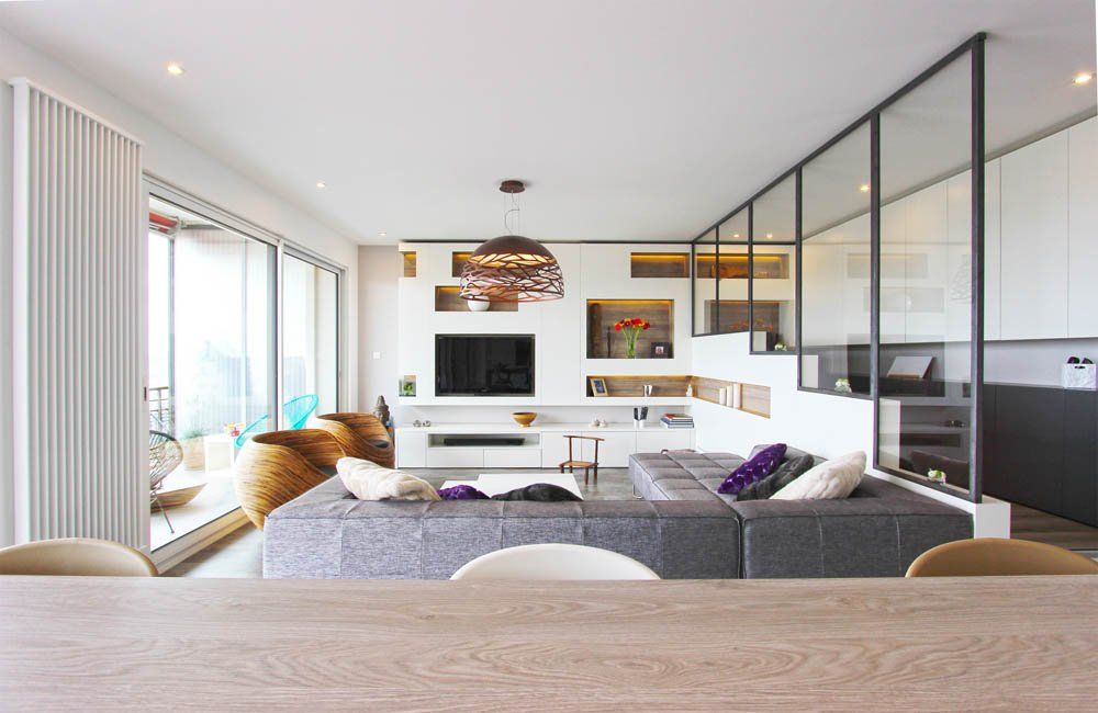 Salon après travaux de rénovation par Atelier OCTA à Lyon