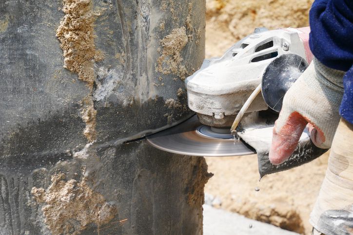 Electric Cutter Penetrating A Cement Pillar | Salt Lake City, UT | Walsh Concrete Cutting Specialists