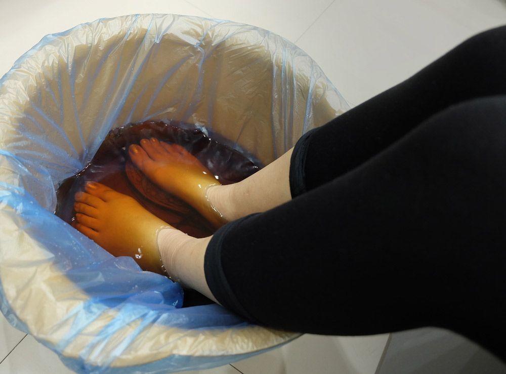 Chinese Foot Bath And Black Pant — Ionspa Foot Detoxing in Glenfield Park, NSW